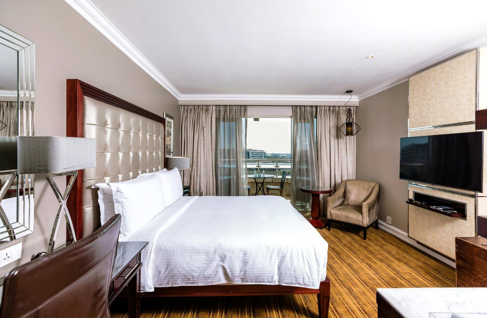 洲际约翰内斯堡or坦博机场酒店 肯普顿帕克 外观 照片 A bedroom at the Hilton